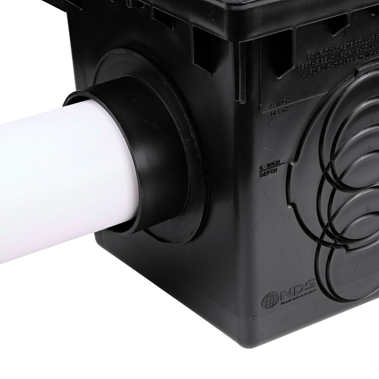 The NDS Internal Spigot Outlet Adapter (NDS 1242) on a 12 in. Catch Basin Drain (NDS 1200) connected to a 4 in. sewer and drain pipe