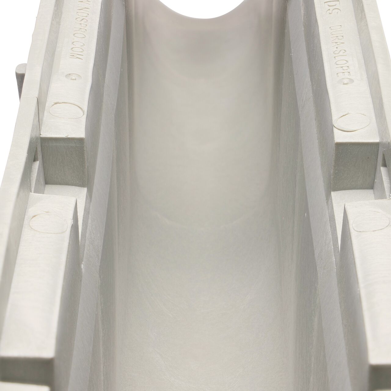 Closeup view of the grooved interior on the NDS Dura Slope Channel Drain, which supports and secures grates with the grate locking system (NDS DS-109N, NDS DS-110, NDS DS-111, NDS DS-112)