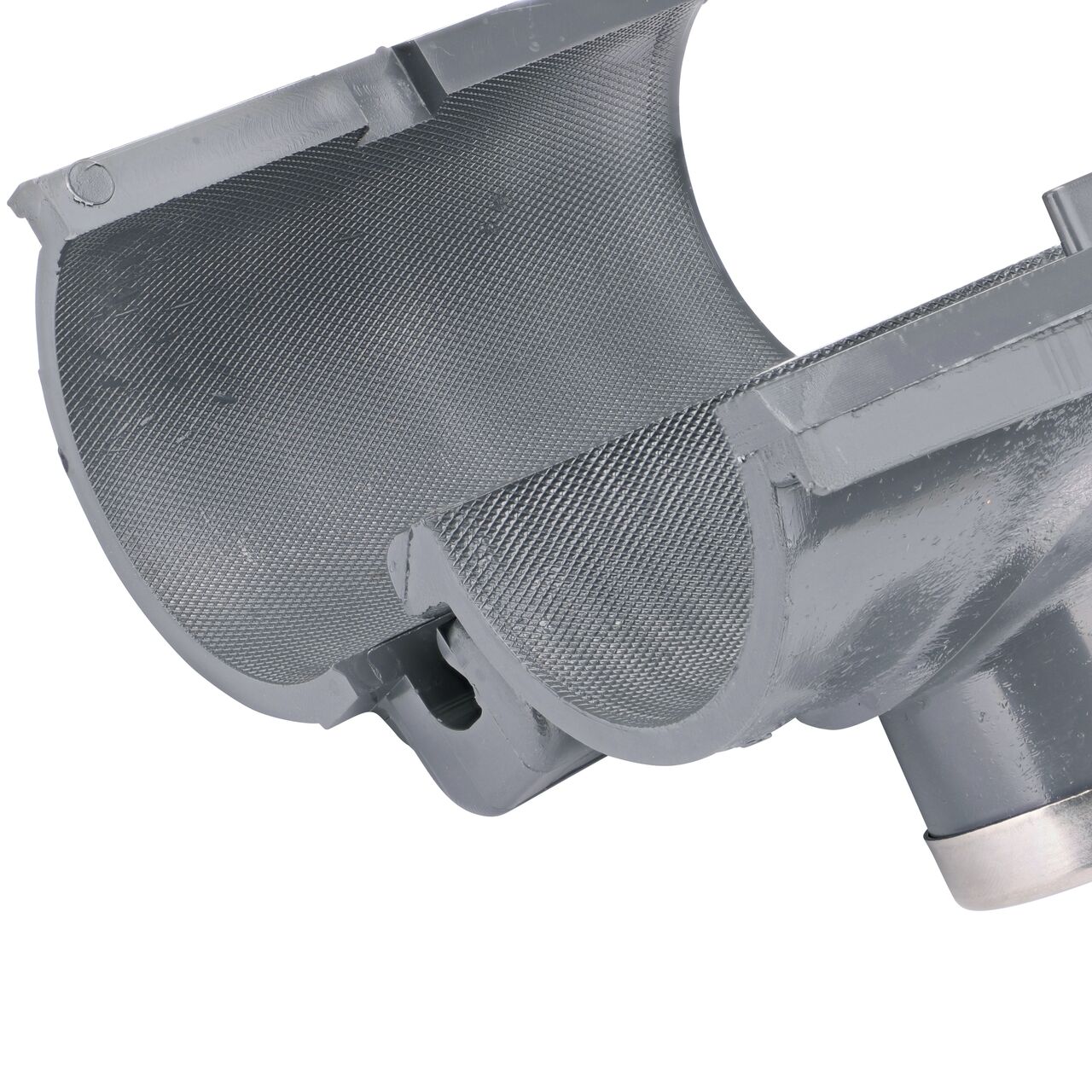 Closeup of the hinge open on the NDS Clamp-It™ Rigid PVC Saddle with 1 in. FPT connection on top (NDS 422010) for 2 in. PVC pipe