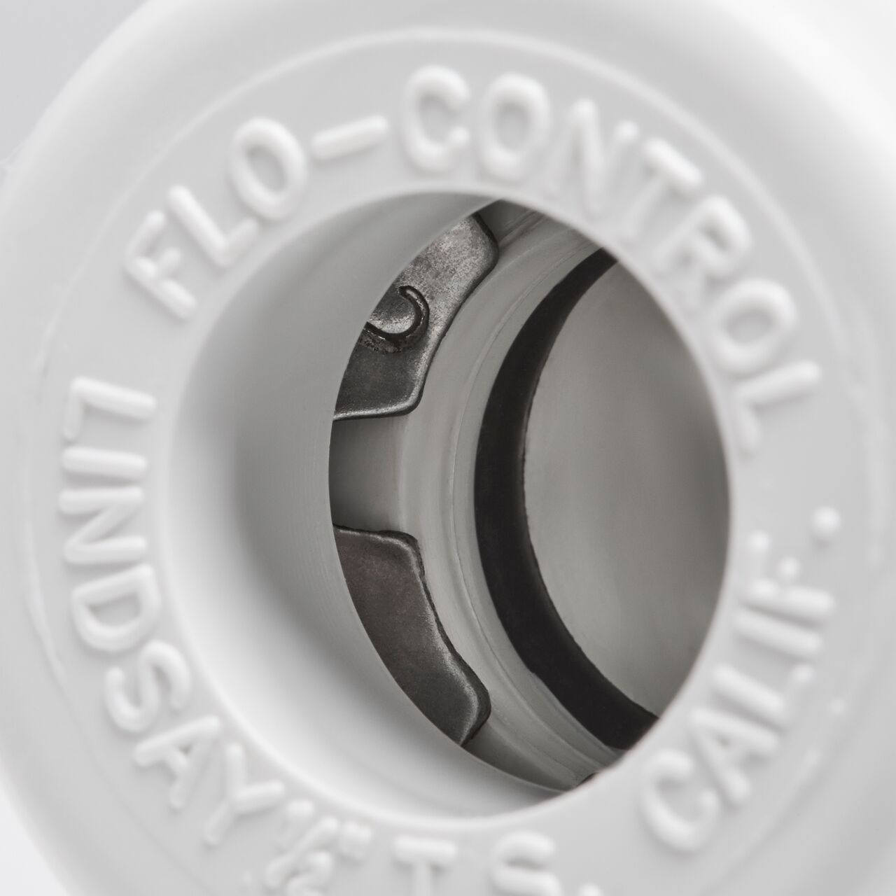 Closeup of the steel gripper teeth of the NDS Flo-Lock™ PVC Gripper Adapter, 1/2 in. CTS X 1/2 in. CTS MPT (NDS 235-05)