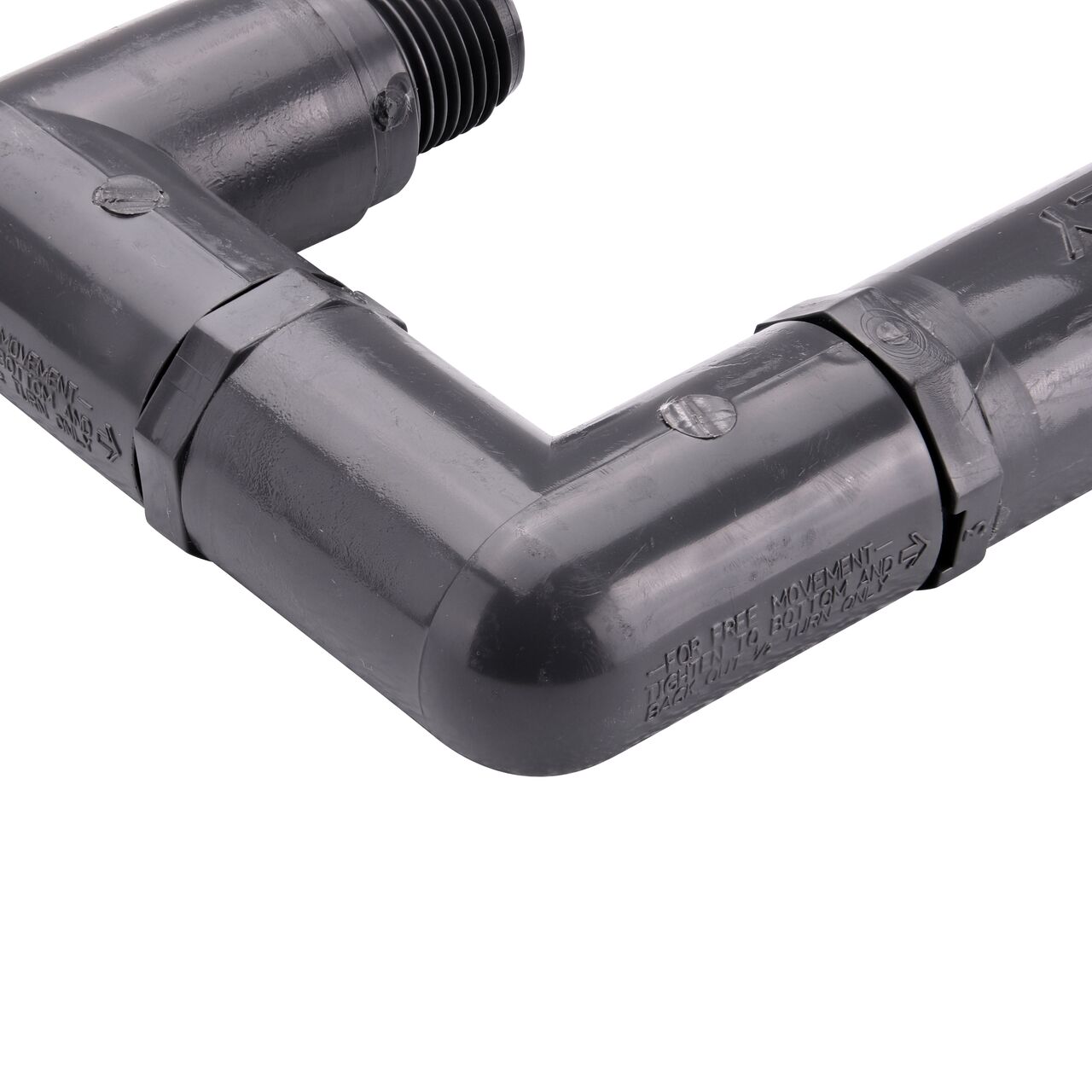 Closeup view of the NDS PVC Triple Swing Joints Assembly, Sch. 80 1/2 in. MPT showing the flow direction and sprinkler can easily be repositioned after installation if needed (NDS TSA-0500-TT)