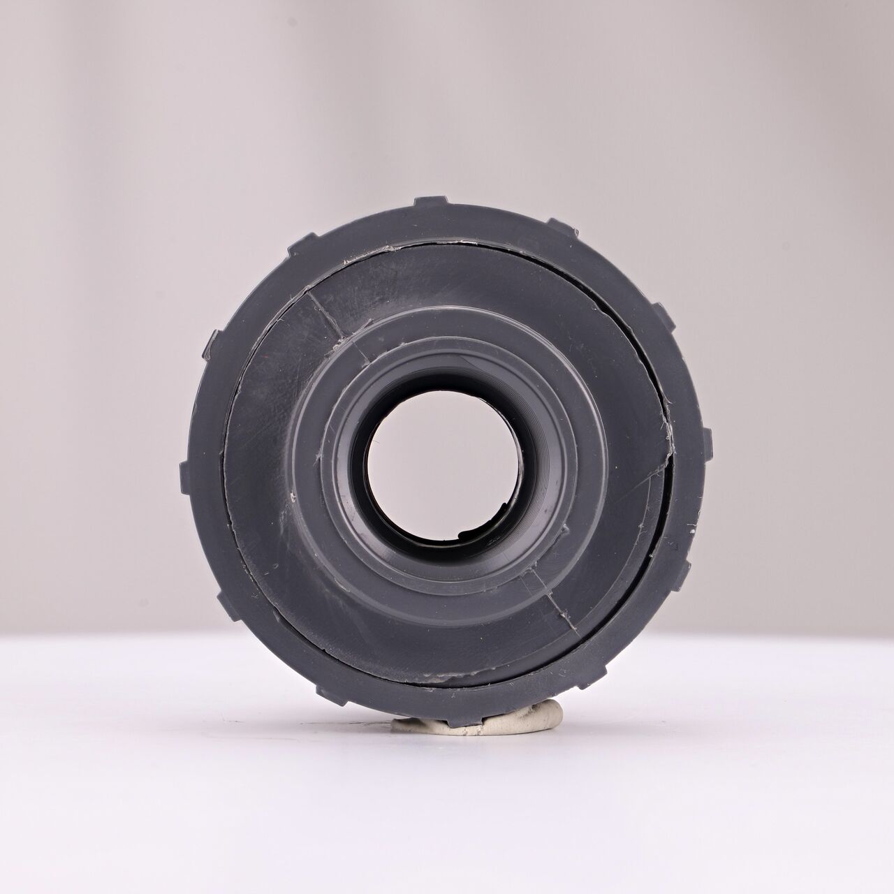The inside of the threaded NDS 3/4 in. PVC Union which allows water to flow through while preventing leaks and made of durable PVC plastic (NDS U-0750-T)