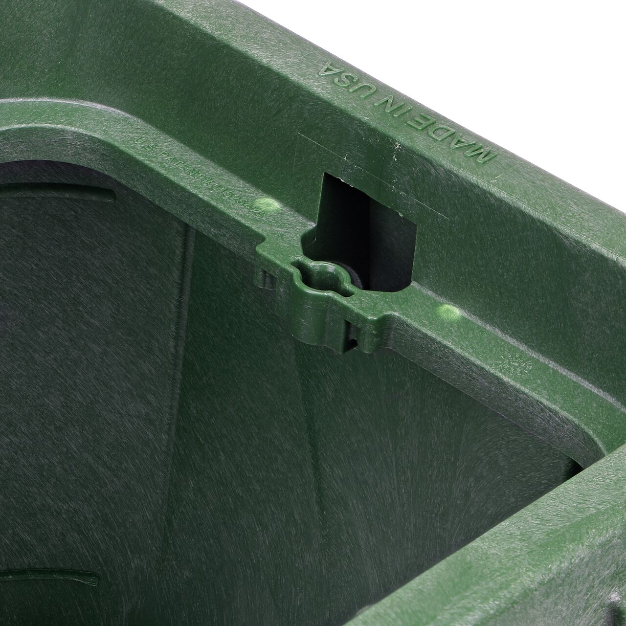Closeup view of the universal locking mechanism on the Green NDS 14 in. X 19 in. Rectangular Pro-Spec® Series Valve Box (NDS 314BCBRG) for securing valve lid or cover to the valve box