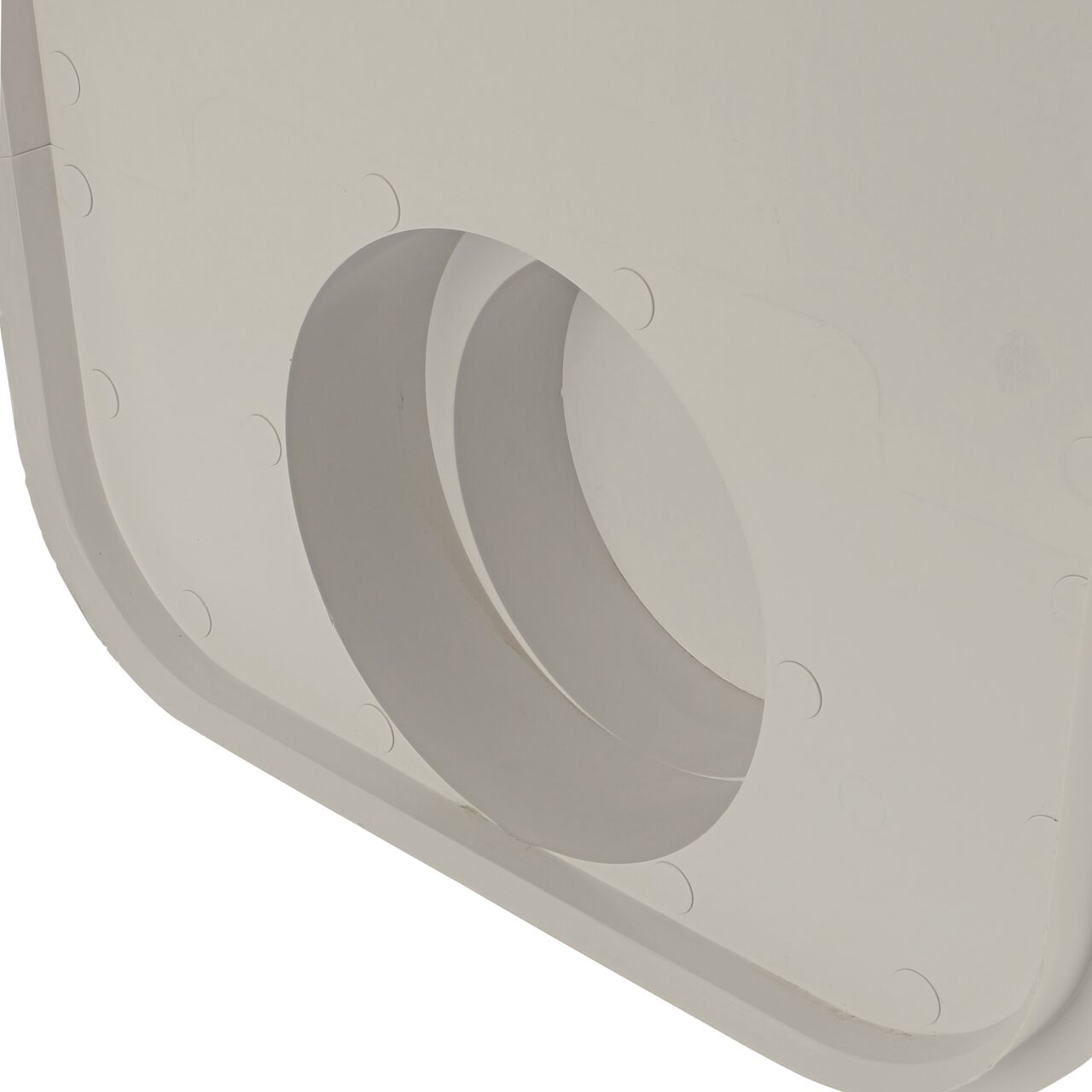 Closeup of the back of the outlet of the NDS Light Gray 12 in. Pro Series Channel™ Drain End Cap/End Outlet (NDS 844)