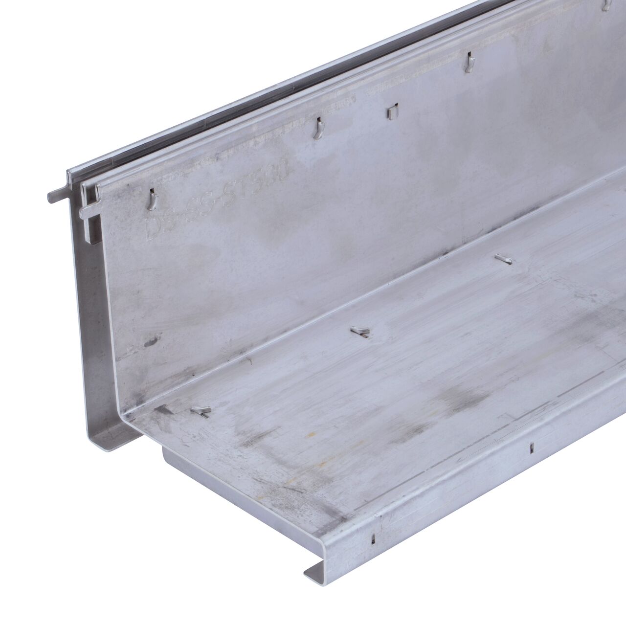 Close up view of the edge of the NDS Dura Slope stainless steel slot top channel drain grate (NDS DS-SS-ST500) from the front
