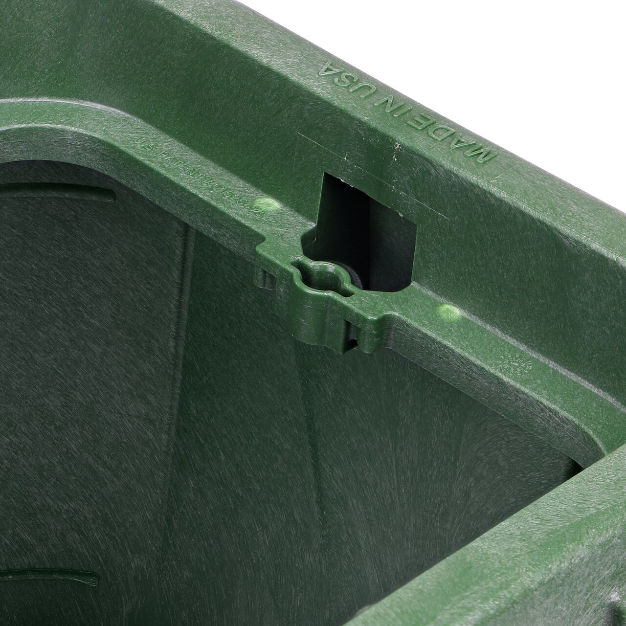Closeup view of the universal locking mechanism on the Green NDS 14 in. X 19 in. Rectangular Pro-Spec® Series Valve Box (NDS 314BCB) for securing valve lid or cover to the valve box