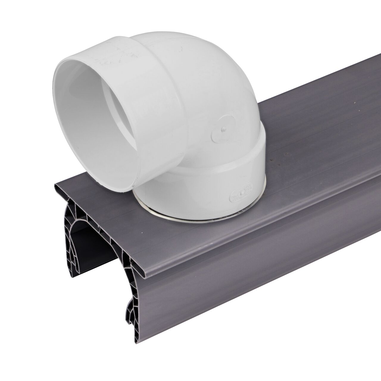 Connect 3 inch or 4 inch sewer and drain fittings to the NDS Spee-D® Channel Drain with Bottom Outlet (NDS 234) shown here with a NDS 4 inch PVC S&D 90° Elbow (NDS 4P02)