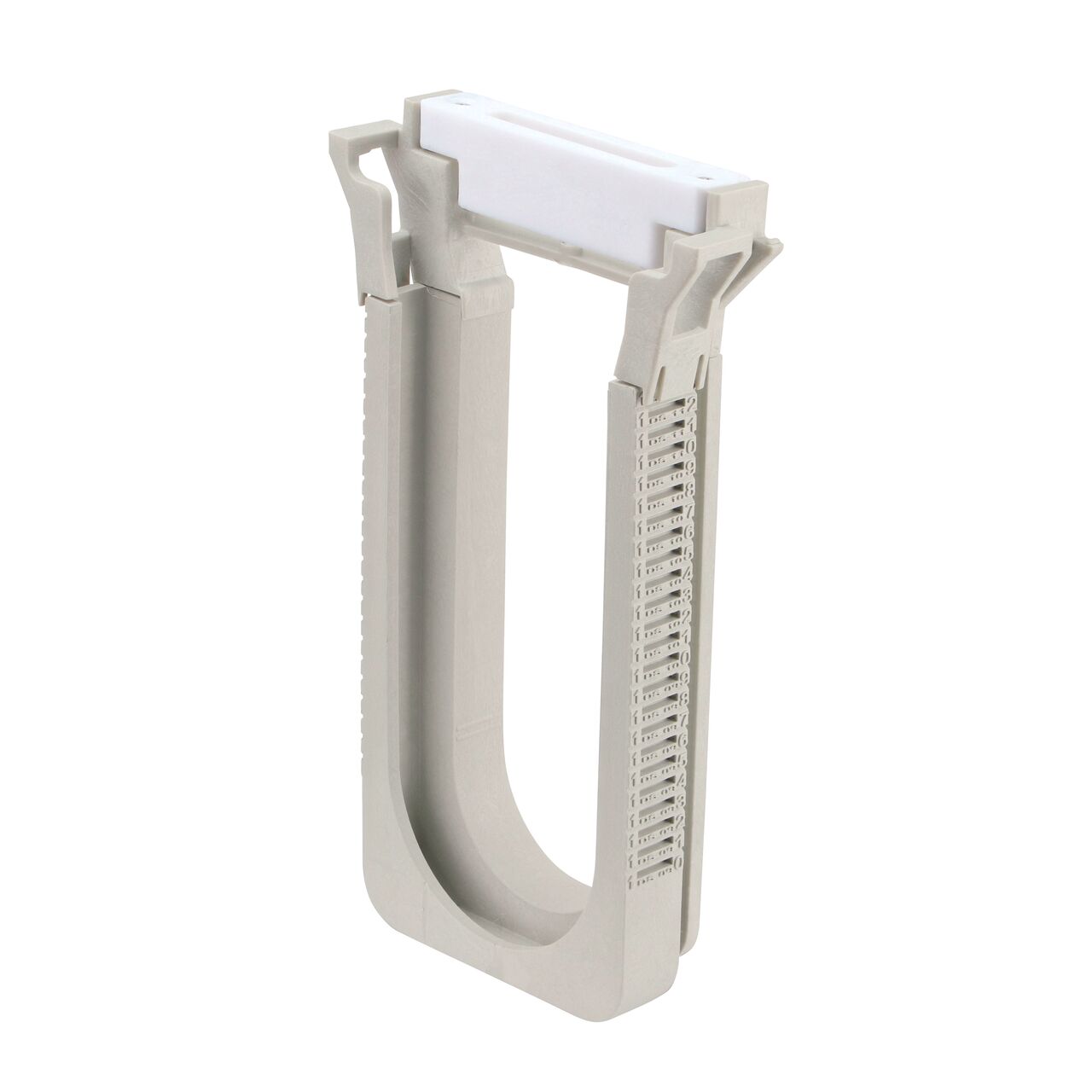 One White Slotted Plastic Dura Slope™ Channel Drain EZ-Track™ Radius Coupling Grate (NDS DS-660MG) installed on one Dura Slope EZ-Track Radius Coupling (NDS DSRC)