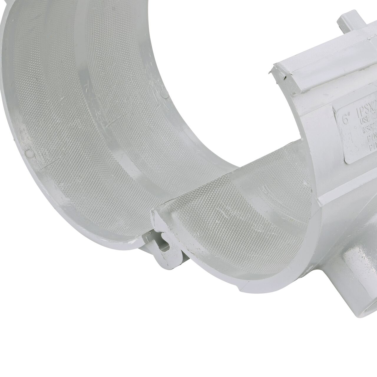 Closeup of the hinge open on the NDS Clamp-It™ Rigid PVC Saddle with 1-1/2 in. slip connection on top (NDS  456015) for 6 in. PVC pipe