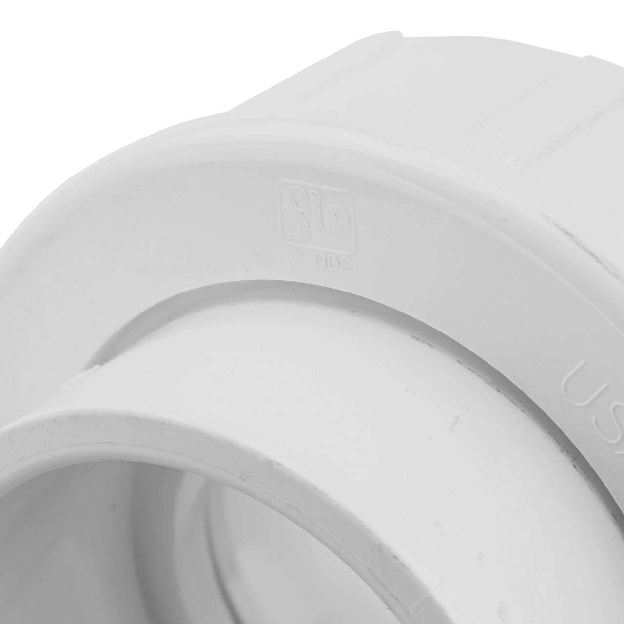 Close up view of the PVC Union, 3 in. Sch. 40 S X S showing NDS brand a leader in flow management solutions and the preferred choice of professionals since 1972 mark (NDS WU-3000-S)