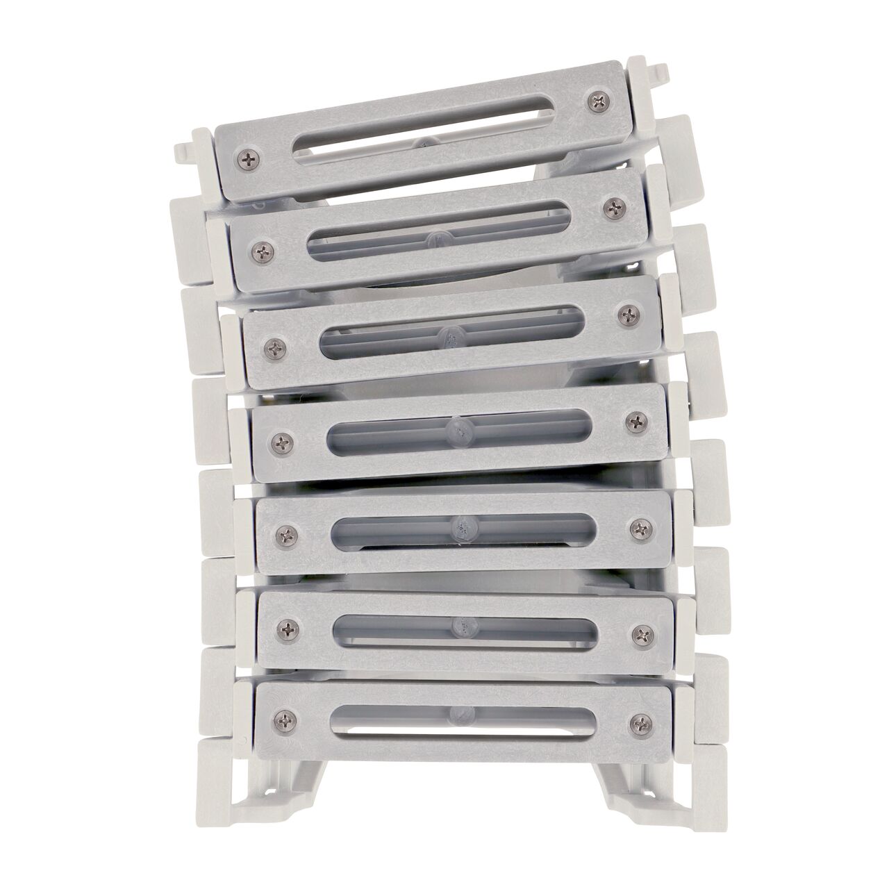 Top down view of 3 degree bend in Seven Dark Gray Slotted Plastic Dura Slope™ Channel Drain EZ-Track™ Radius Coupling Grates (NDS DS-661MG) installed on seven Dura Slope EZ-Track Radius Couplings (NDS DSRC)