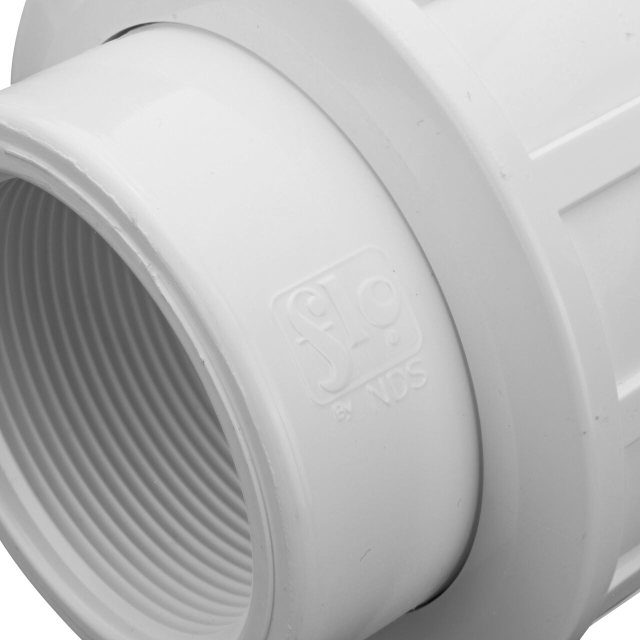 Closeup view of the size mark showing it is 2 in. IPS female connection point that makes a leak-resistant connection between pipes (NDS WU-1250-T)