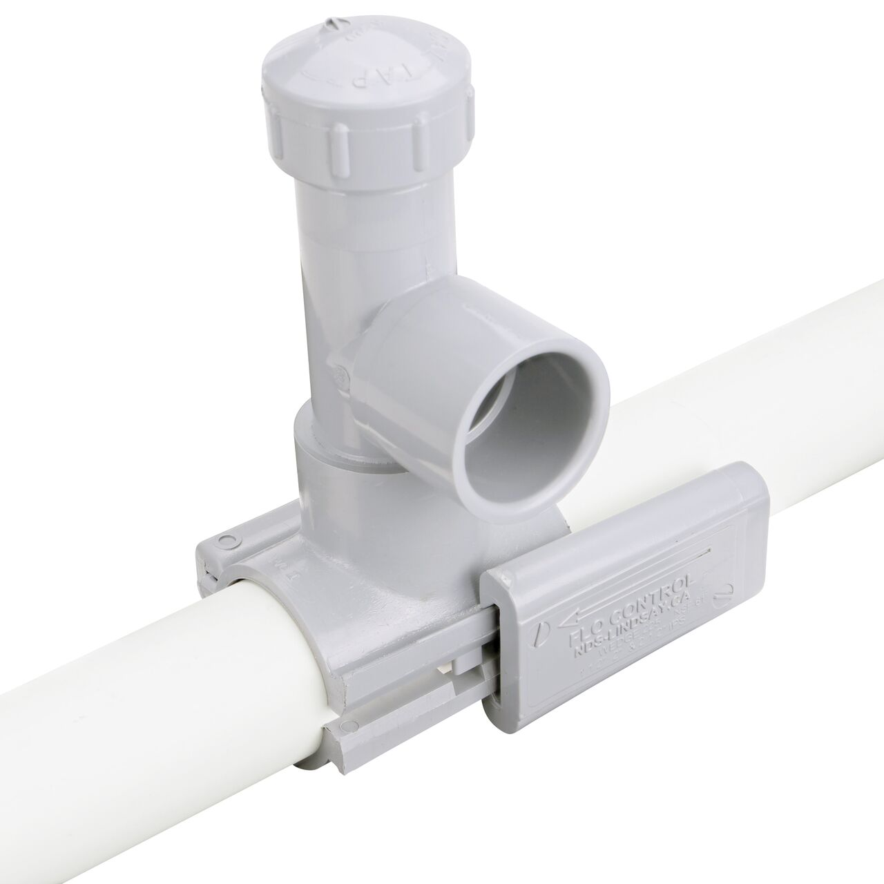 To install, remove wedge and clamp saddle over pipe on the 2 in. NDS Flo-Tap™ Rigid PVC saddle with 1-1/2 in. socket or 2 in. spigot (NDS 3220)
