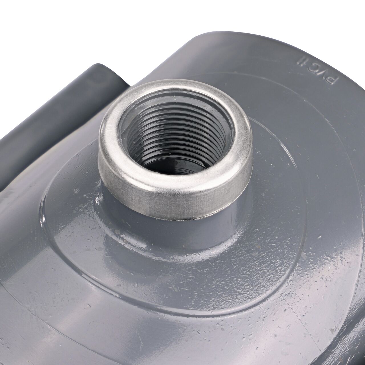 Closeup of the 3/4 in. FPT connection on the NDS Clamp-It™ Rigid PVC Saddle (NDS 444007) for 4 in. PVC pipe