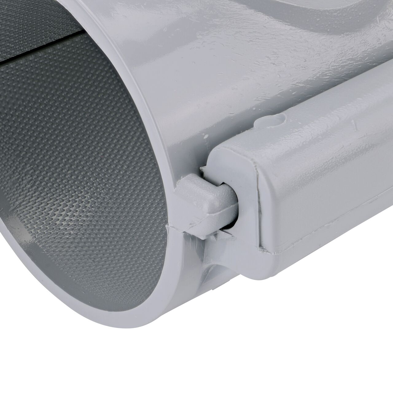 Closeup of the hinge closed on the NDS Clamp-It™ Rigid PVC Saddle with 2 in. FPT connection on top (NDS 443020) for 3 in. PVC pipe