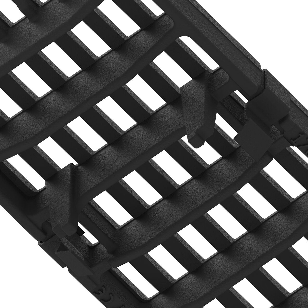 Underside of the class D bar design ductile iron BG-FILCOTEN® 100 Trench Drain Grate (NDS 17010110) showing part number, support legs, and secure clips