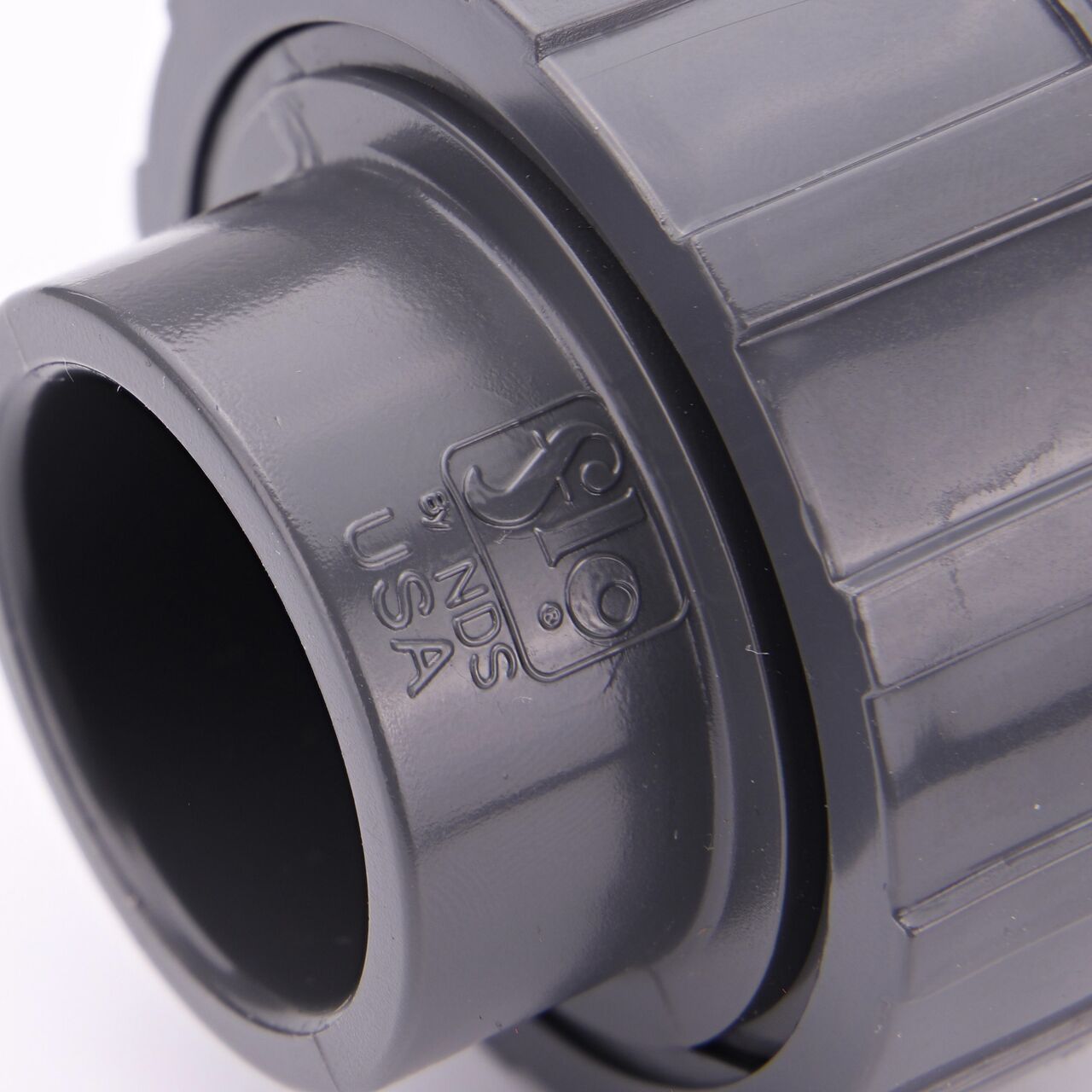 Close up view of the NDS 3/4 in. PVC Union showing NDS brand a leader in flow management solutions and the preferred choice of professionals since 1972 mark (NDS U-0750-S)