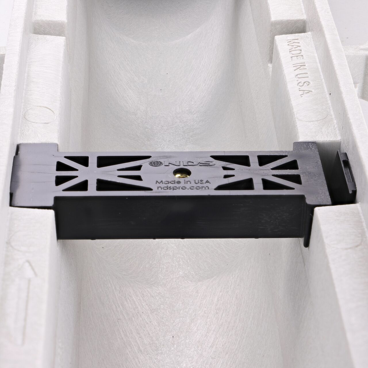 The rebar clip levels channel and grips re-bar and is included on every Dura Slope Channel Drain (NDS DS-094N)