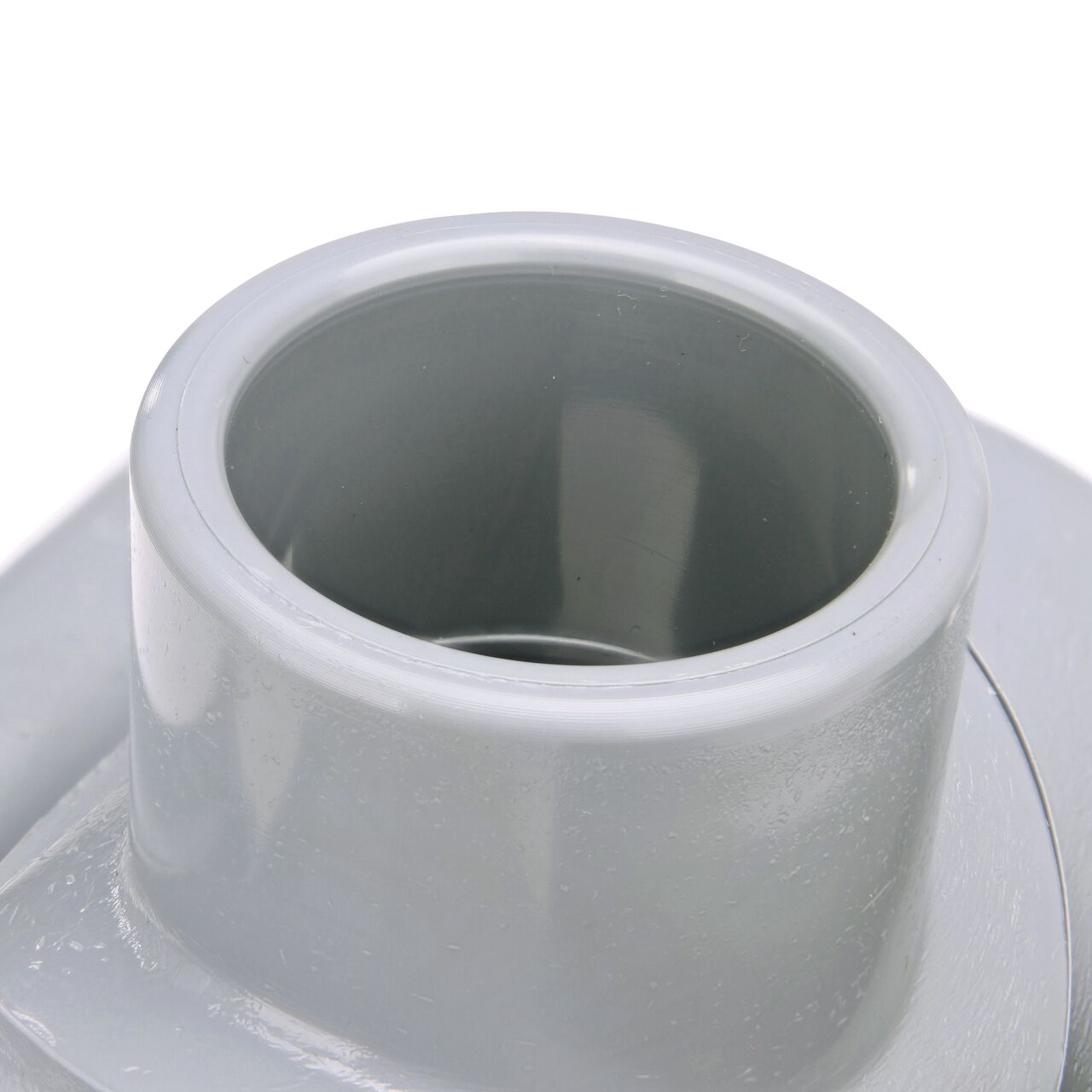Closeup of the 1 in. slip connection on the NDS Clamp-It™ Rigid PVC Saddle (NDS 432010) for 2 in. PVC pipe