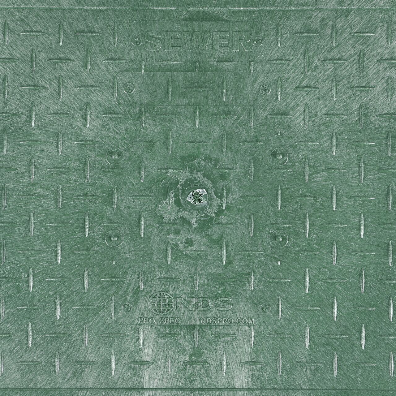 Closeup view of the Sewer markings on the Black Sewer cover for the NDS 13 in. X 24 in. Rectangular Pro-Spec® Series Valve Box (NDS 321BCBS)