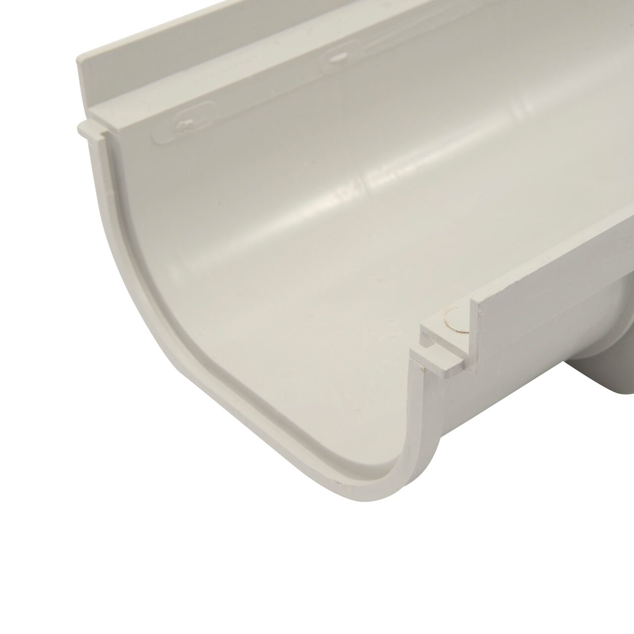 Closeup view of the 8 in. Pro Series Channel Drains showing where they connect together with interlocking joints on ends; grate sits on grate seat (NDS 830)