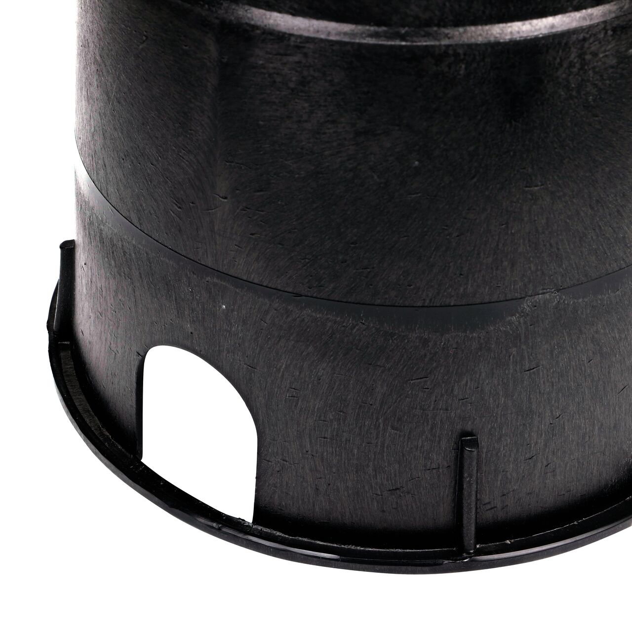 Closeup of the 10 in. Round Valve Box PVC pipe hole; allows irrigation pipe entry into box interior (NDS 111BC)