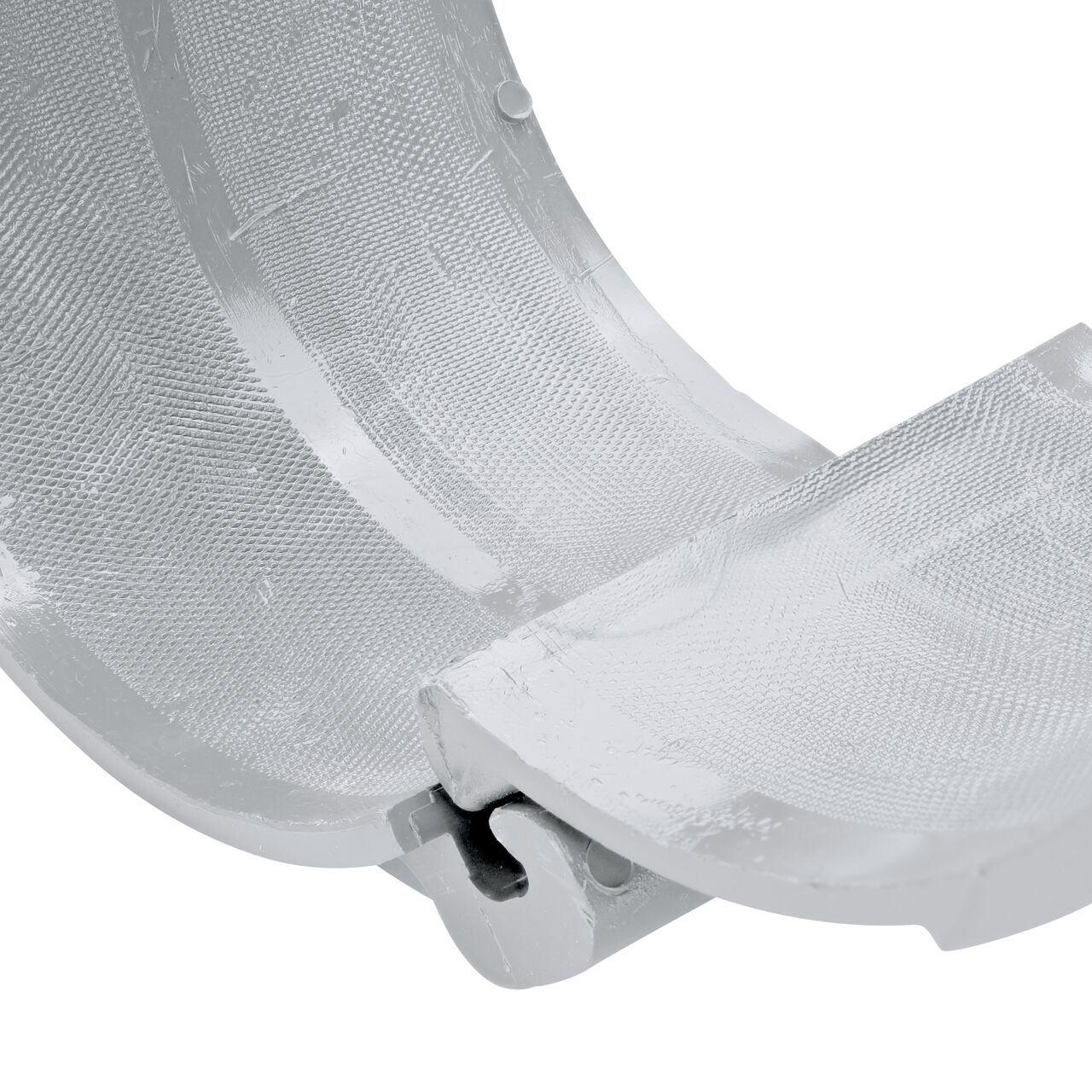 Closeup view of the hinge on the 6 in. NDS Flo-Tap™ Rigid PVC saddle with 1-1/2 in. socket or 2 in. spigot connection on top (NDS 3260) in the opened position that allows for easy installation onto Schedule 40 or Schedule 80 PVC pipe