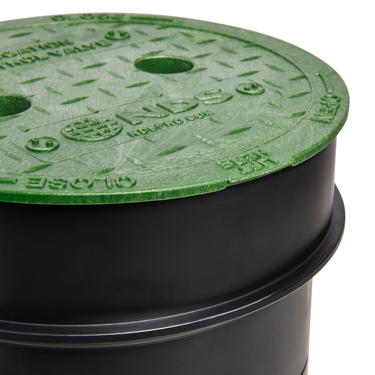 Lift the 6 in. NDS Green Irrigation Control Valve cover for irrigation maintenance, repairs, or inspections (NDS 2108BC)