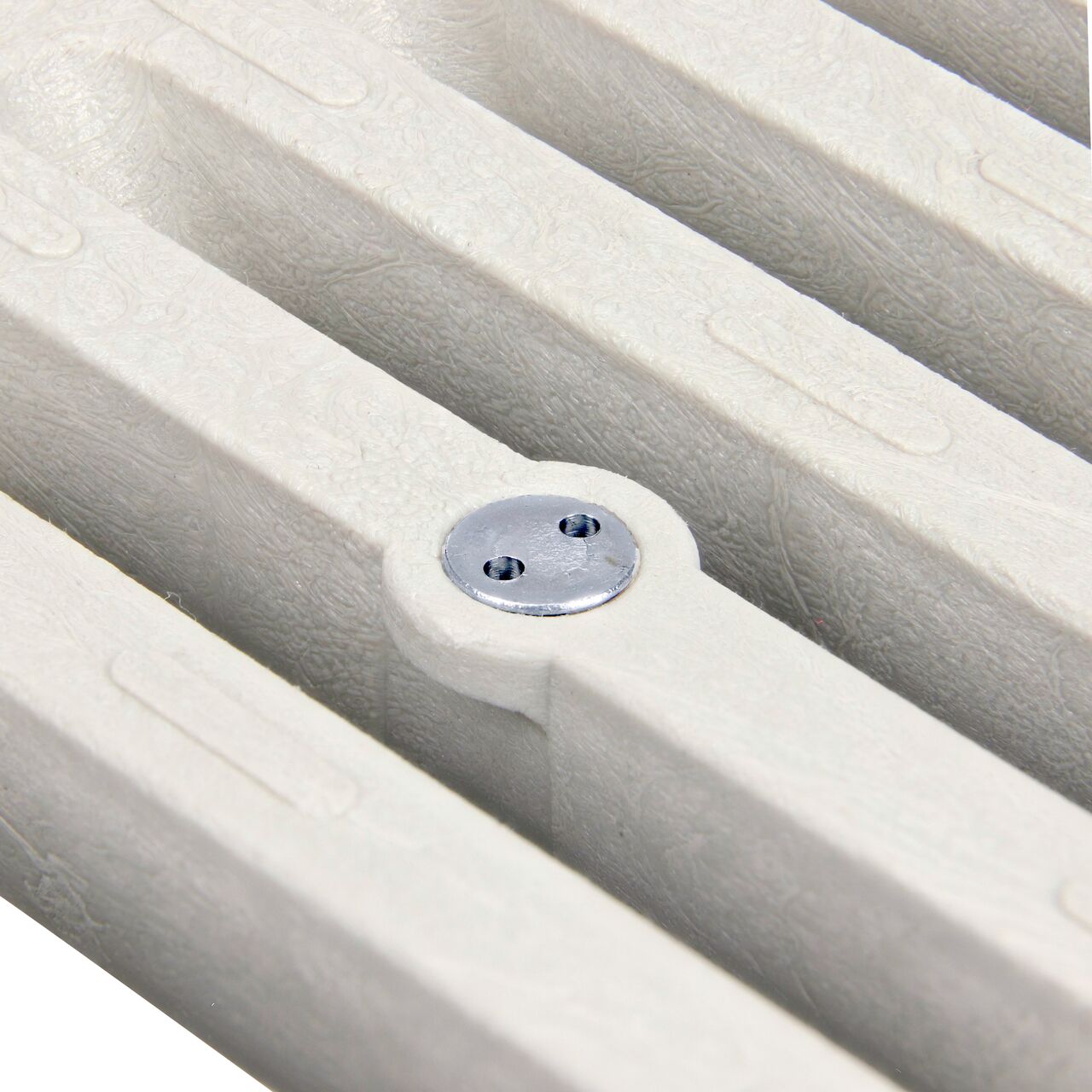 Closeup of the Dura Slope Spanner Head Screw (NDS DS-650) installed on a Dura Slope Channel Drain Grate