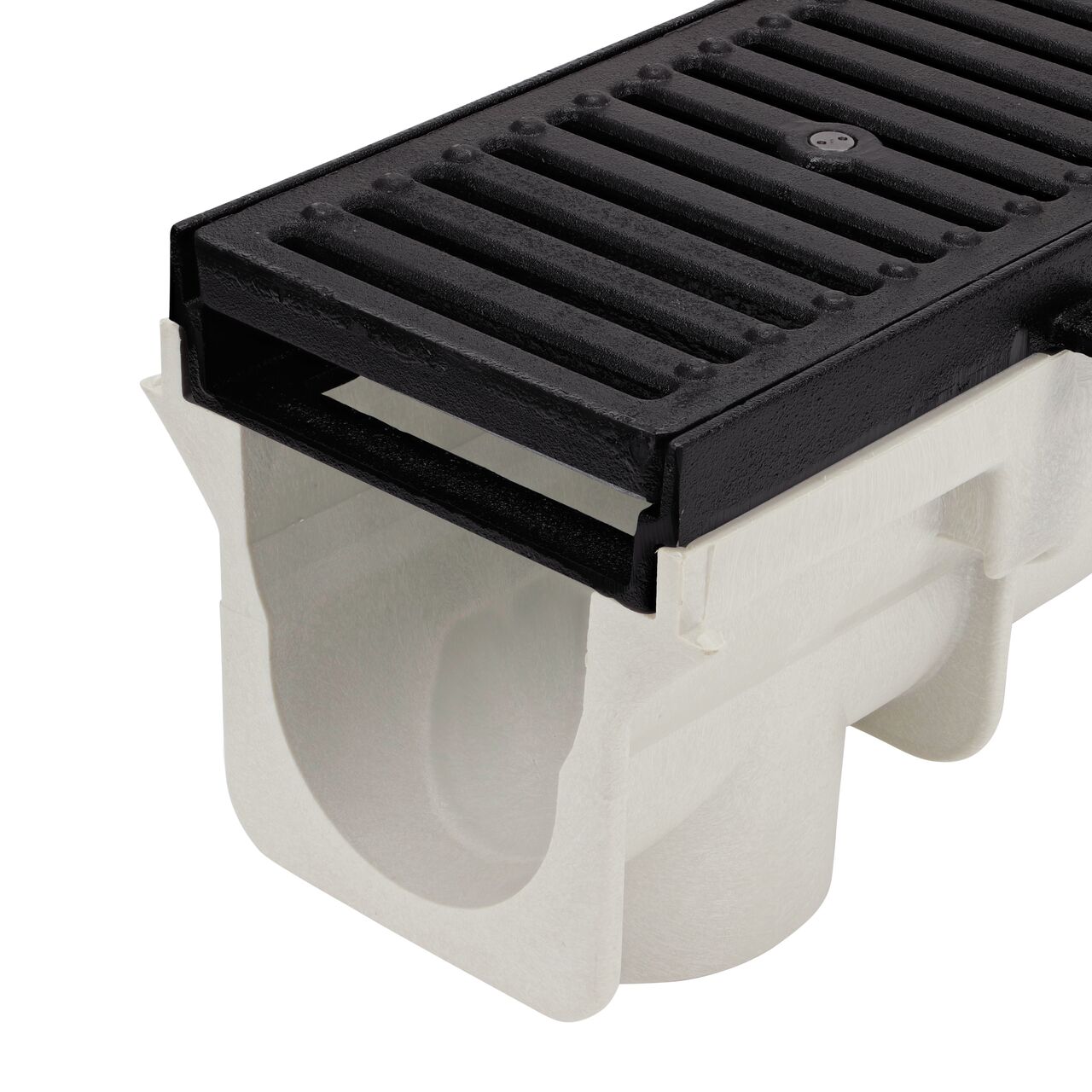 Closeup of the Cast Iron Dura Slope™ Channel Drain Grate (NDS DS-231) installed on the Dura Slope™ Channel Drain Frame  (NDS DS-200H) on a NDS Dura Slope Channel Drain (NDS DS-091); with male end facing camera