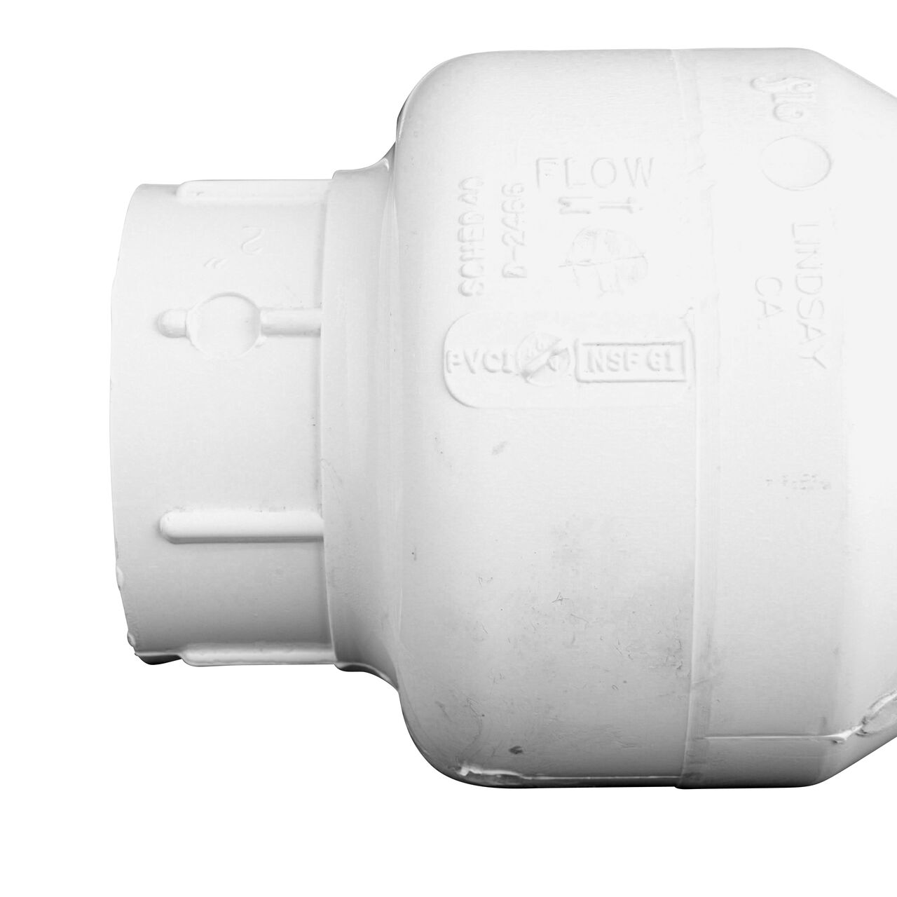 Closeup of the arrow showing water flow direction on the NDS White 2 in. slip end by slip end with Viton™ O-Ring PVC Swing Check Valve (NDS 1520V20)
