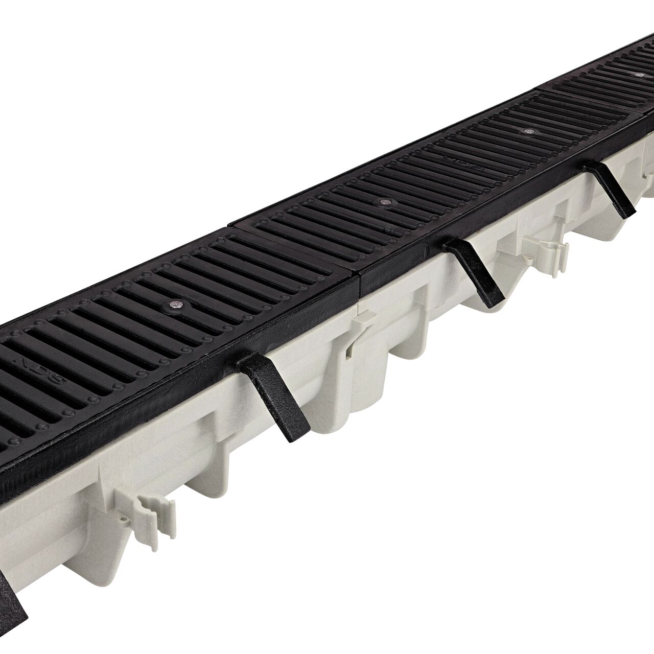 Completely installed multiple Dura Slope™ Channel Drain Frames (NDS DS-200H) with Cast Iron Dura Slope™ Channel Drain Grates (NDS DS-231) installed on mulitiple NDS Dura Slope Channel Drains (NDS DS-091)