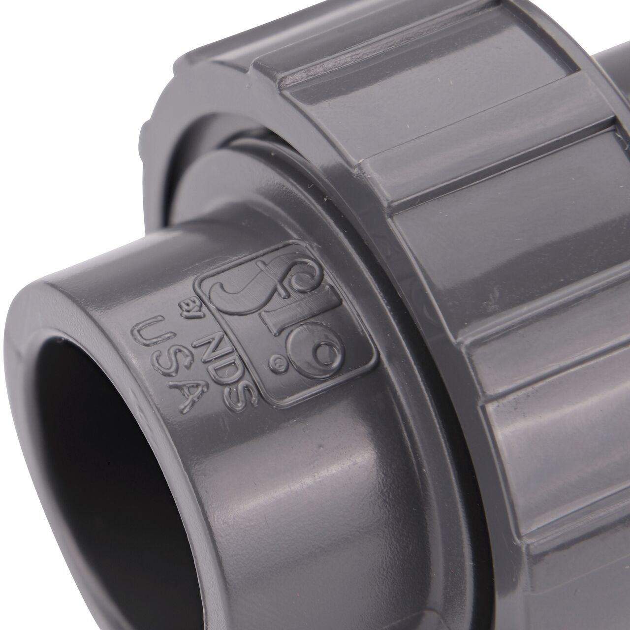 Close up view of the NDS 1/2 in. PVC Union showing NDS brand a leader in flow management solutions and the preferred choice of professionals since 1972 mark (NDS U-0500-S)