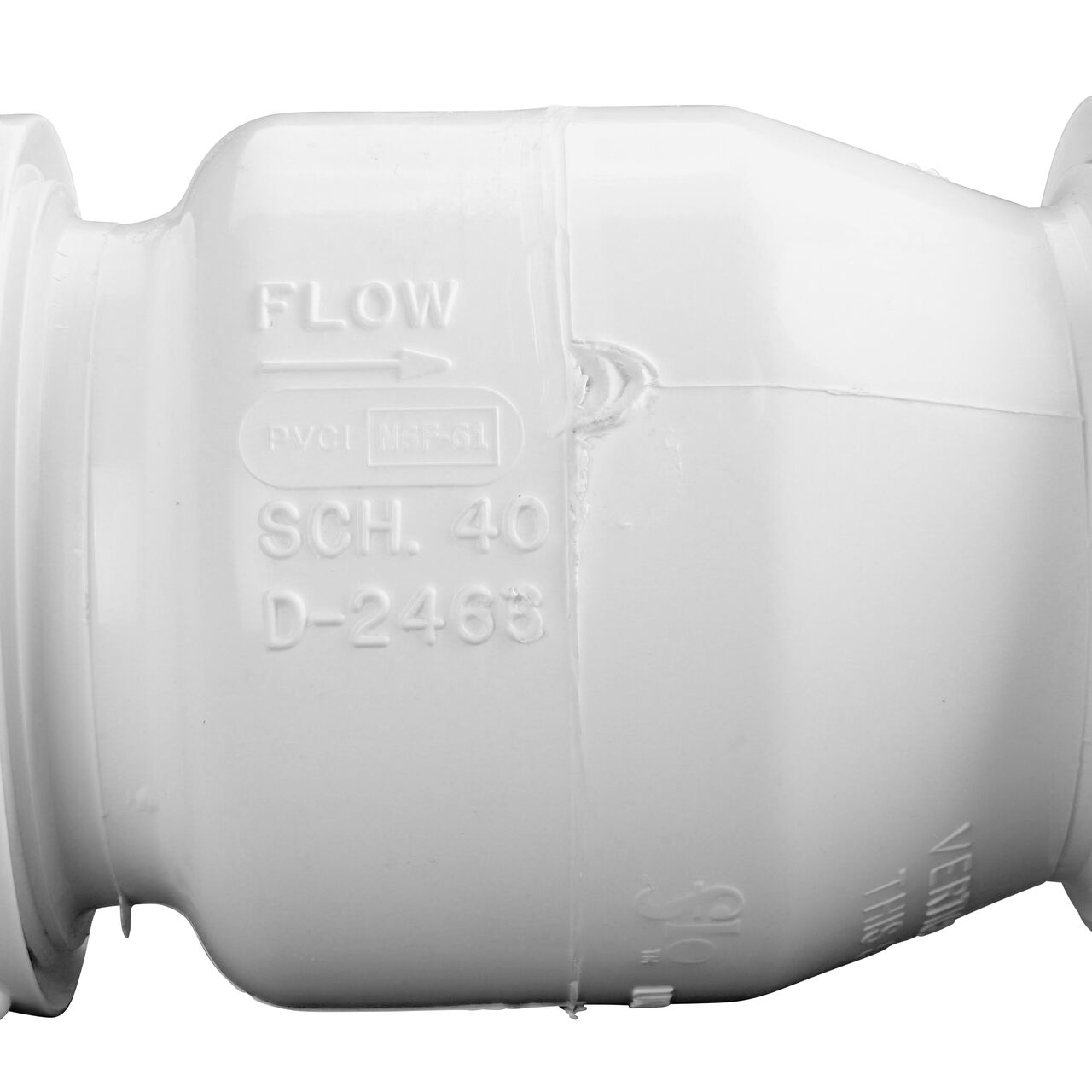 Closeup of the arrow showing water flow direction on the NDS White 1-1/2 in. IPS leak resistant PVC True Union Swing Check Valve (NDS  1720-15)