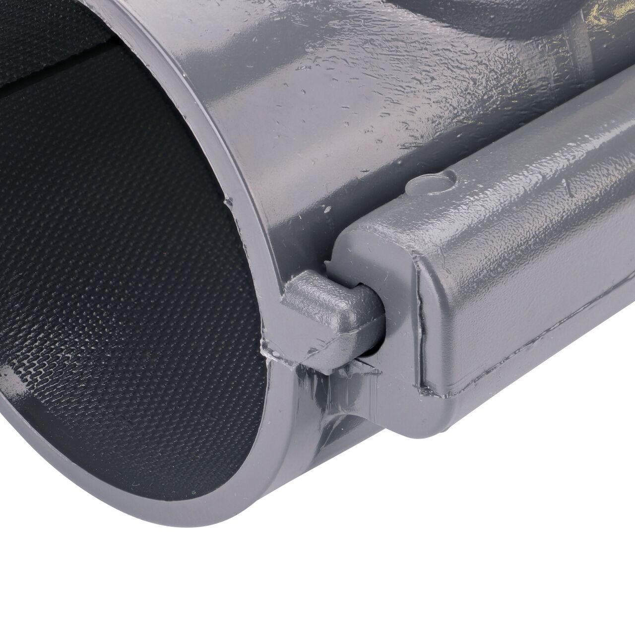 Closeup of the hinge closed on the NDS Clamp-It™ Rigid PVC Saddle with 1-1/4 in. FPT connection on top (NDS 443012) for 3 in. PVC pipe