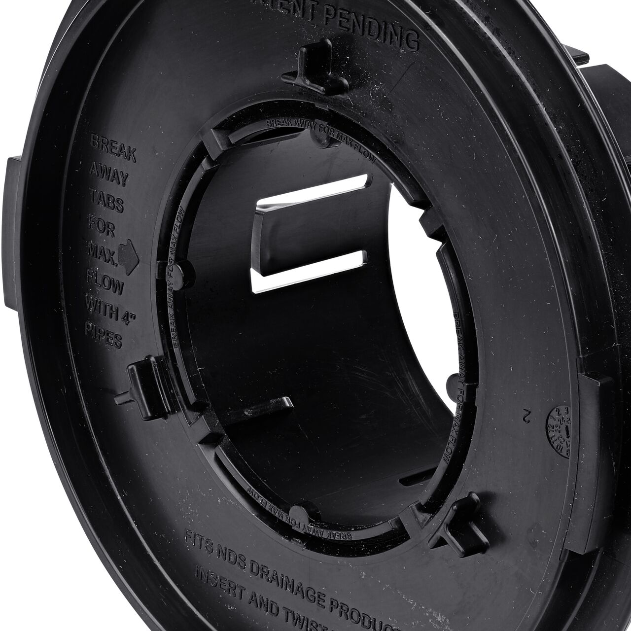 Closeup of the interior tabs of the  NDS Locking Outlet Adapter (NDS 1243)
