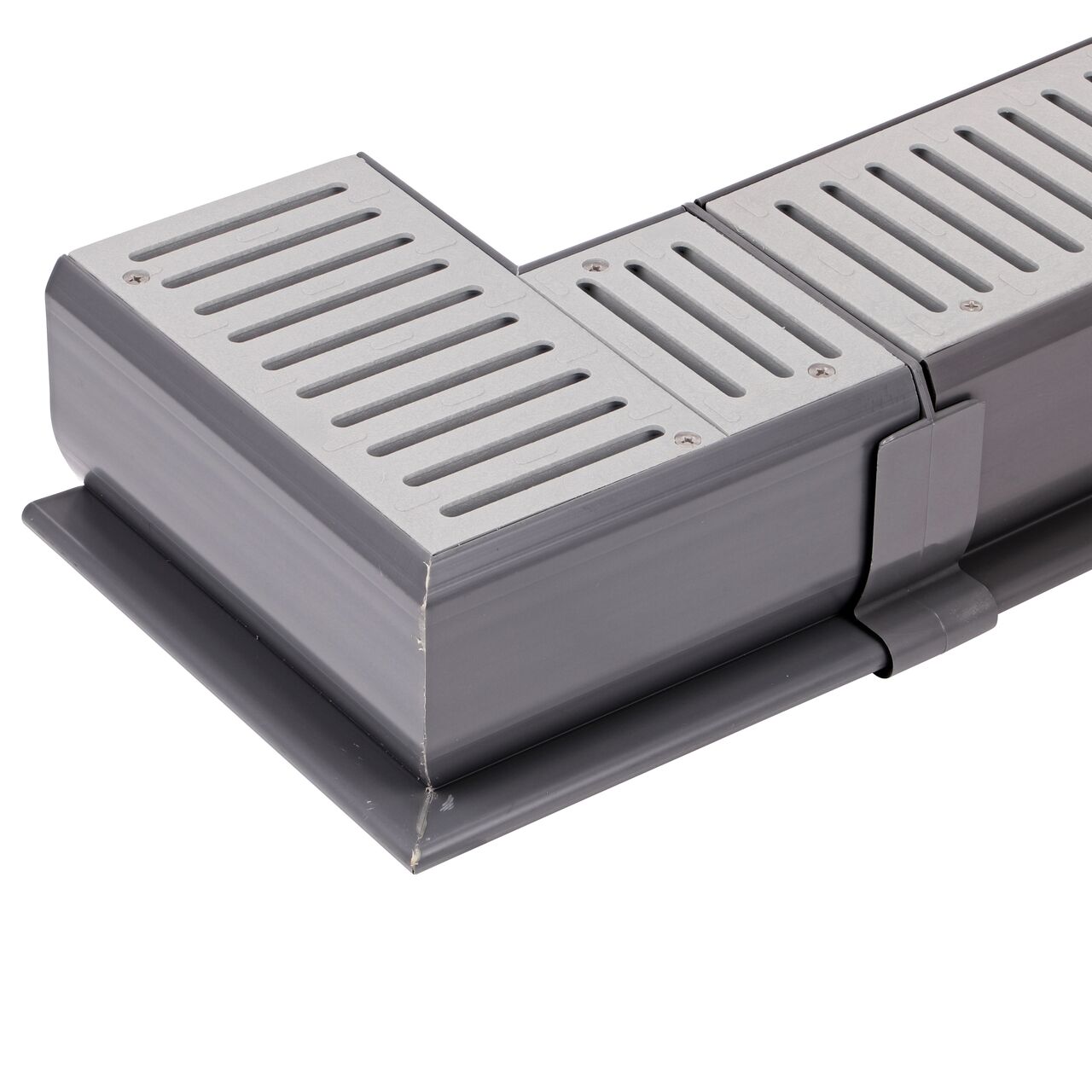 Connect the shorter end on the Spee-D® Channel Drain 90° Elbow and Grate (NDS 2381) to the longer Spee-D® Channel Drain (NDS 400, NDS 400-10, NDS 400-10WH) with the Spee-D® Channel Drain Coupling