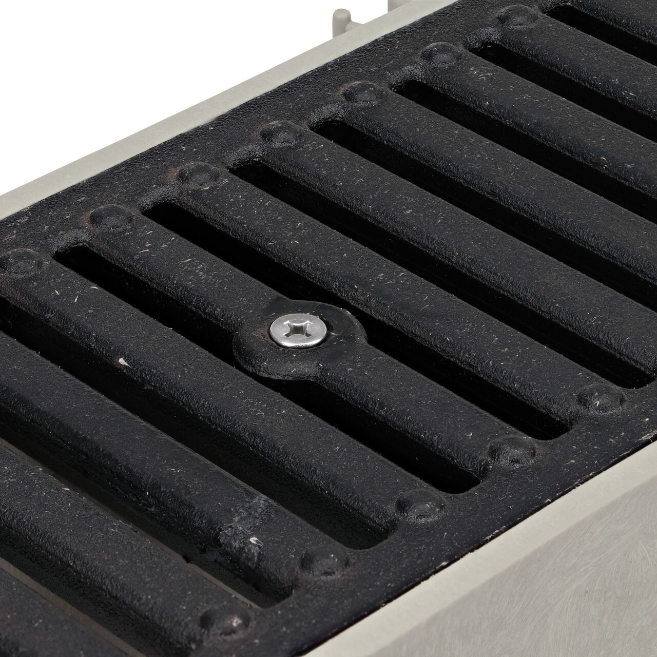 The shorter length 1/4 in. Phillips Flat Head Screw (NDS 629) secures any ductile iron Dura Slope Grate to the Dura Slope channel drain via the ProFit Grate Lock to prevent displacement from heavy runoff flows, pedestrian and vehicular traffic, and to deter potential theft and vandalism