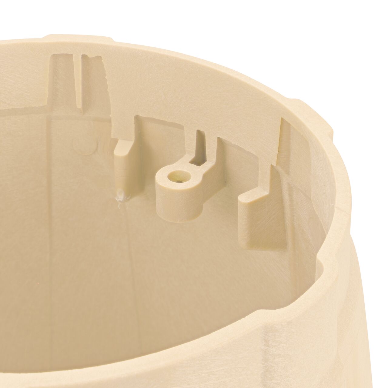 Closeup view of the bolt hole on the Sand NDS 10 in. Round Pro-Spec® Series Valve Box (NDS 312BCSAND) for securing valve lid or cover to the valve box