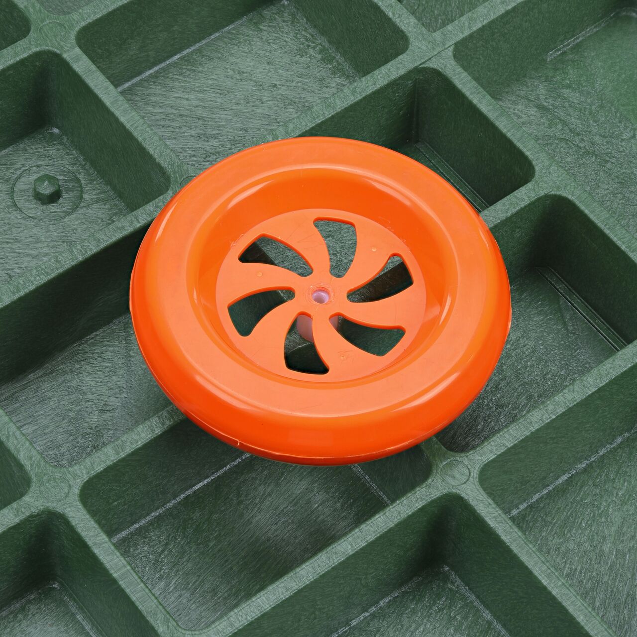 The first step in removing the electronic marker disc is to remove the center screw on the underside of the telecom cover for the NDS 17 in. X 30 in. Rectangular Pro-Spec® Series Telecom Box (NDS 326BCBT-BG-M)