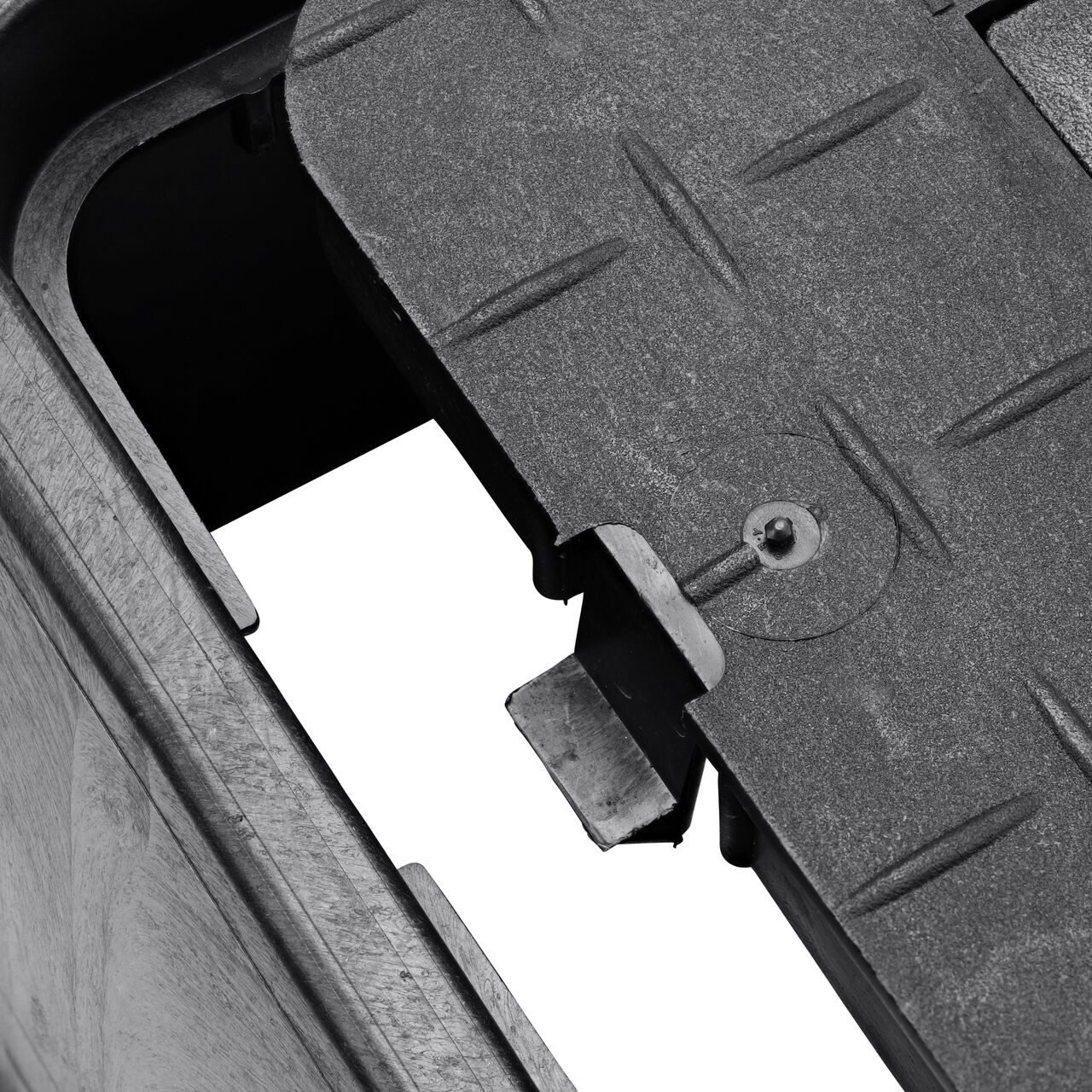 Closeup view of the hinged side of the plastic reader door on the NDS 10 in. X 15 in. Rectangular D1000 Meter Series Meter Box & Water Meter Cover (NDS D1000-RB)