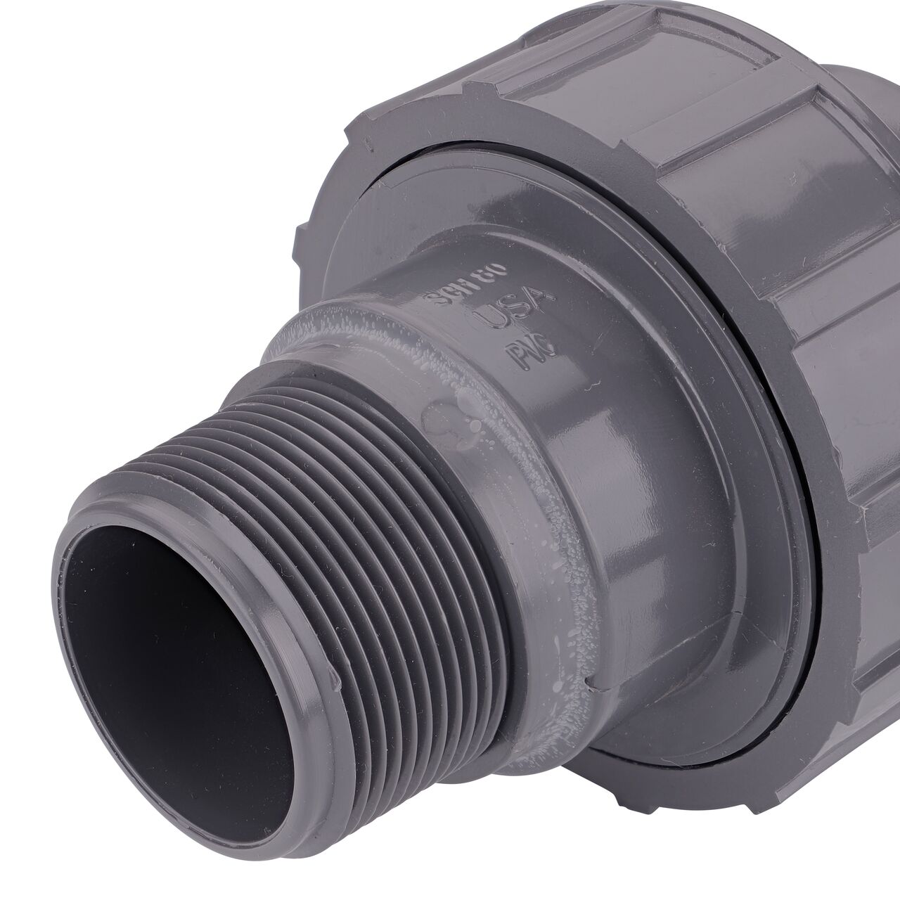 Closeup view of the MPT threaded end on the NDS 1-1/2 in. PVC Union (NDS U-1500-SM) which provides a corrosion-free connection between pipes and prevents costly property damage