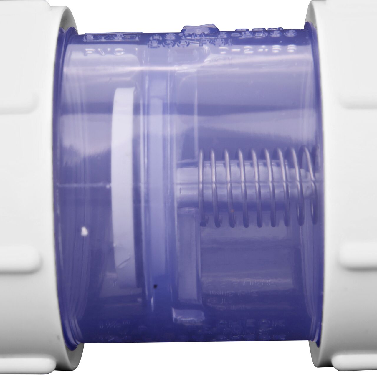 Closeup of the spring in the NDS Clear 1-1/2 in. IPS slip by slip PVC Compact True Union Spring Check Valve (NDS 1790C15)