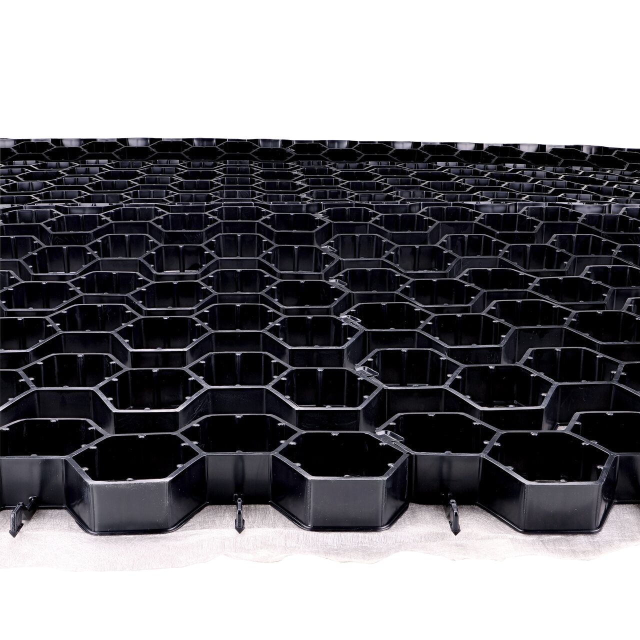 View of Black NDS EZ Roll® Gravel Paver (NDS GP4X150) unrolled from end to end