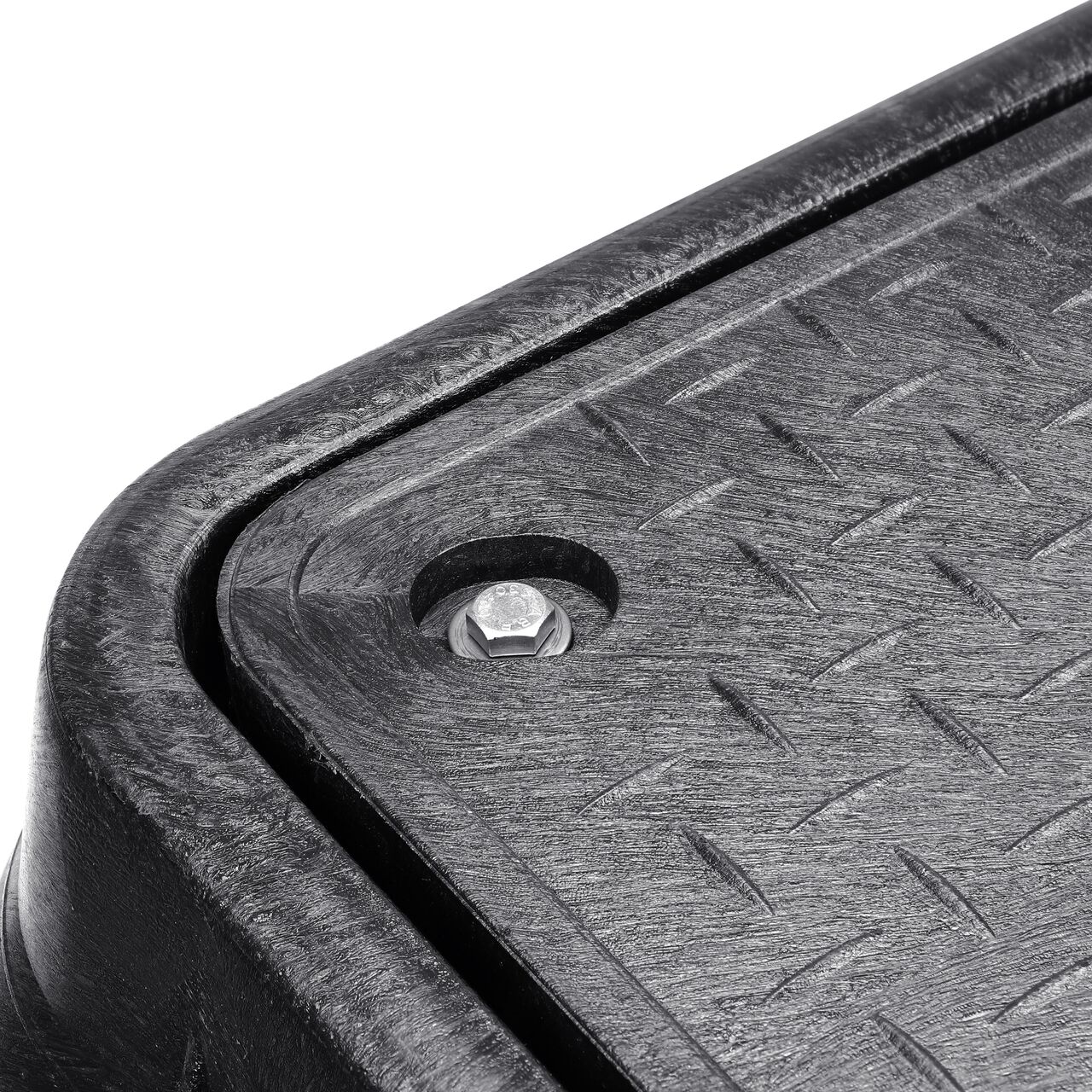 The valve box lid securely in place on the NDS 17 in. X 30 in. Rectangular Standard Series Black Box and Black Water Meter Cover with Bolt (NDS 126BCDMB) keeping components protected against the elements, foot traffic, lawn care equipment, and potential vandalism while keeping them out of sight