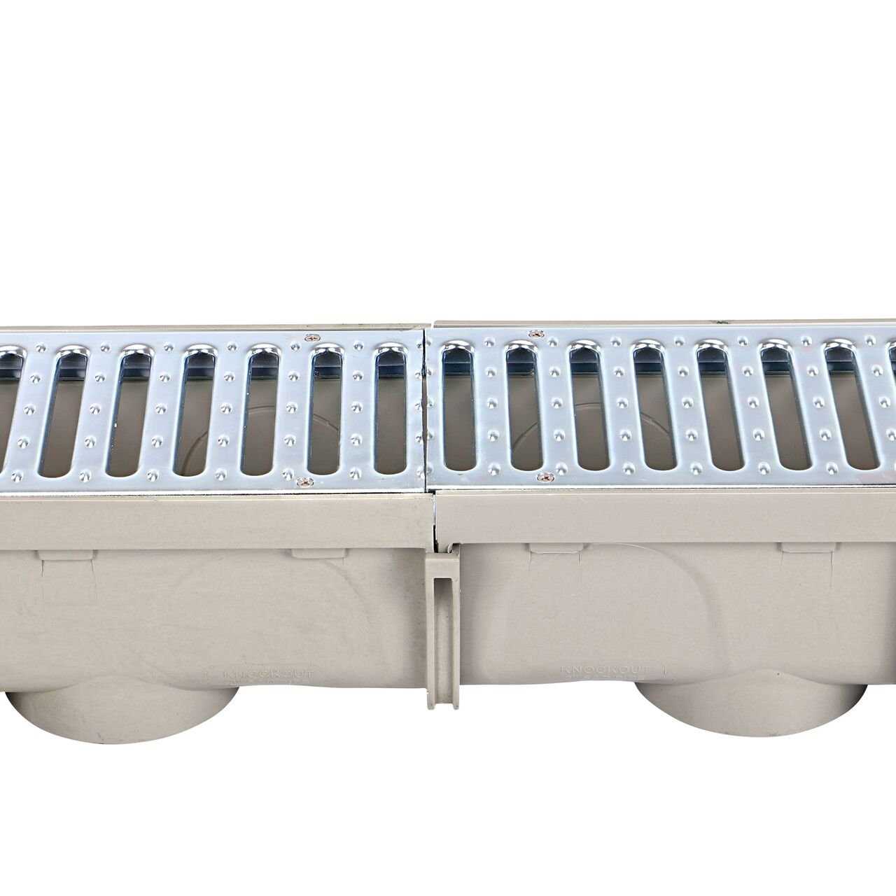 Two sets of the NDS Steel Grate 5 in. Pro Series Channel Drain Kit (NDS 864GMTL) fully connected and locked in place using the interlocking joints with no need for a coupling
