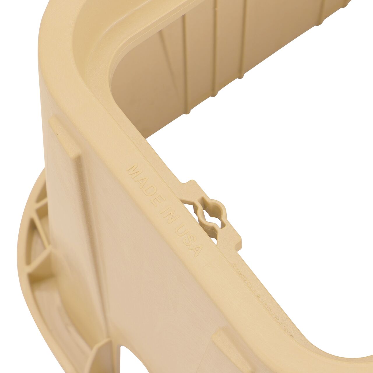 Closeup view of the bolt hole on the Sand NDS 14 in. x 19 in. Rectangular Pro-Spec® Series Valve Box (NDS 314BCBSAND) for securing valve lid or cover to the valve box