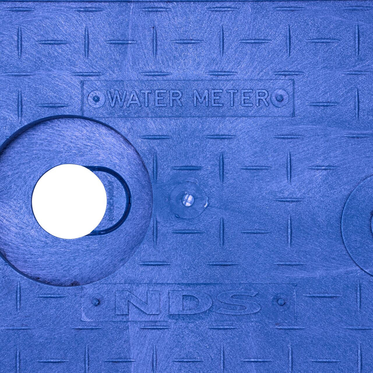 Closeup view of the Water Meter markings on the NDS 14 in. X 19 in. Rectangular AMR Meter Cover (NDS D12AMR-OLLOCTRBLUL)