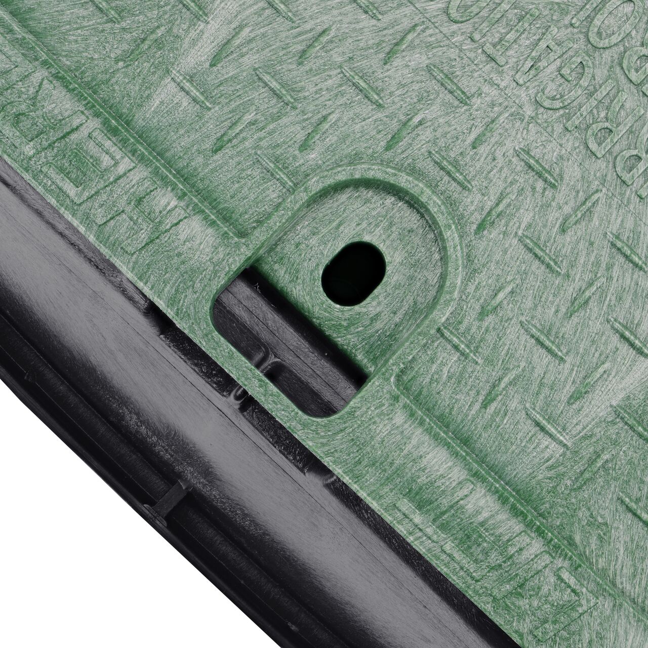 The valve box lid securely in place on the NDS 14 in. x 19 in. Rectangular Standard Series Black Box Tapered Extension and Green Irrigation Control Valve Cover (NDS 115TBC) keeping components protected against the elements, foot traffic, lawn care equipment, and potential vandalism while keeping them out of sight