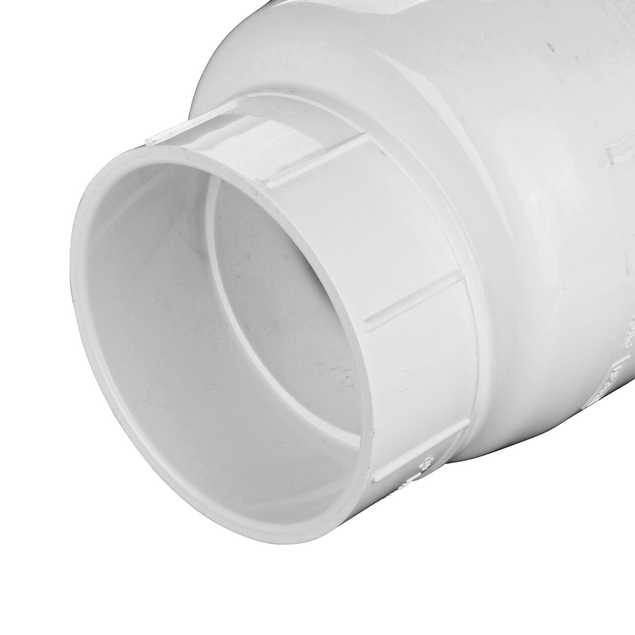 Closeup of the inlet end on the NDS White 4 in. slip end by slip end PVC Swing Check Valve (NDS 1520-40) which prevents backflow in pipelines